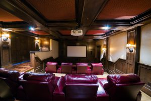 Stock photo of a large home theater in a residence.